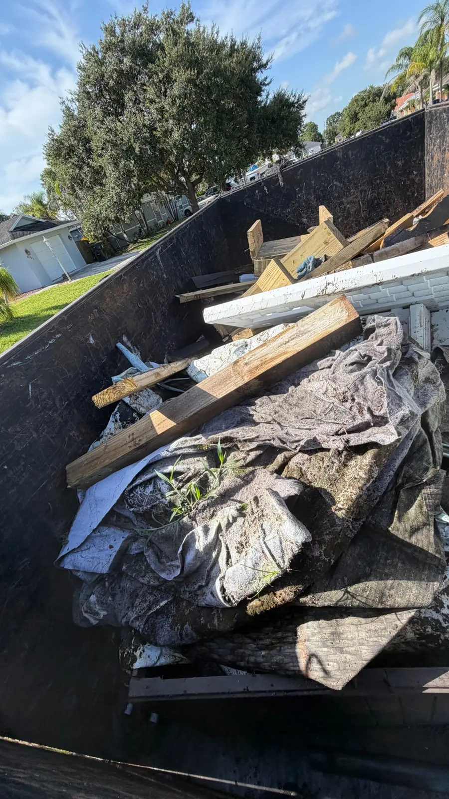 Debris loaded into dump trailer